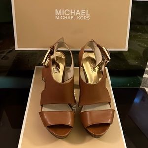 Genuine EUC 7 MK Leather Platform with 4.5 inch heel. Comes in original box